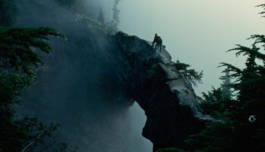 Hikers Stand Near The Top Of A Natural Rock Bridge On Mt. Rainier, Washington, May 1963